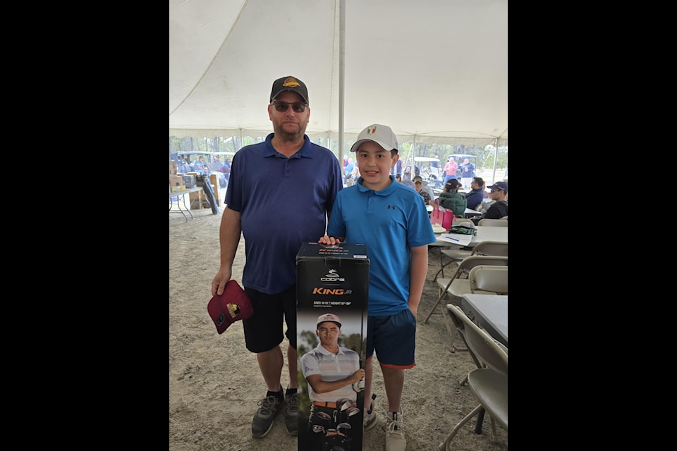 Conan and Cian Donohue captured top spot in the inaugural Adult-Junior Tournament, which made its debut as part of this year's tournament. The father-son duo won in a playoff on Sunday morning. Photo courtesy of Kylie Frederick
