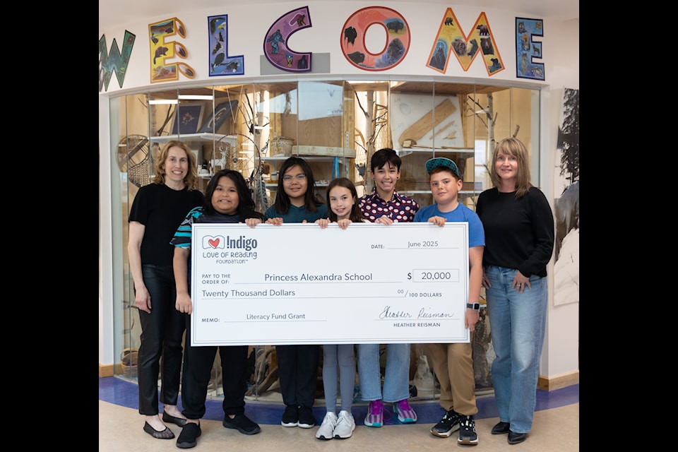 Students at Princess Alexandra School show off the cheque they received from the Indigo Love of Reading Foundation. From left, instructional coach Coral Helmer, Ace Edison, Emily Latour, Alexa Nason, Charlette Hynes-Ruggles, Ben Woehl, and principal Tara Boudreau. Photo courtesy of Marilyn Marshall
