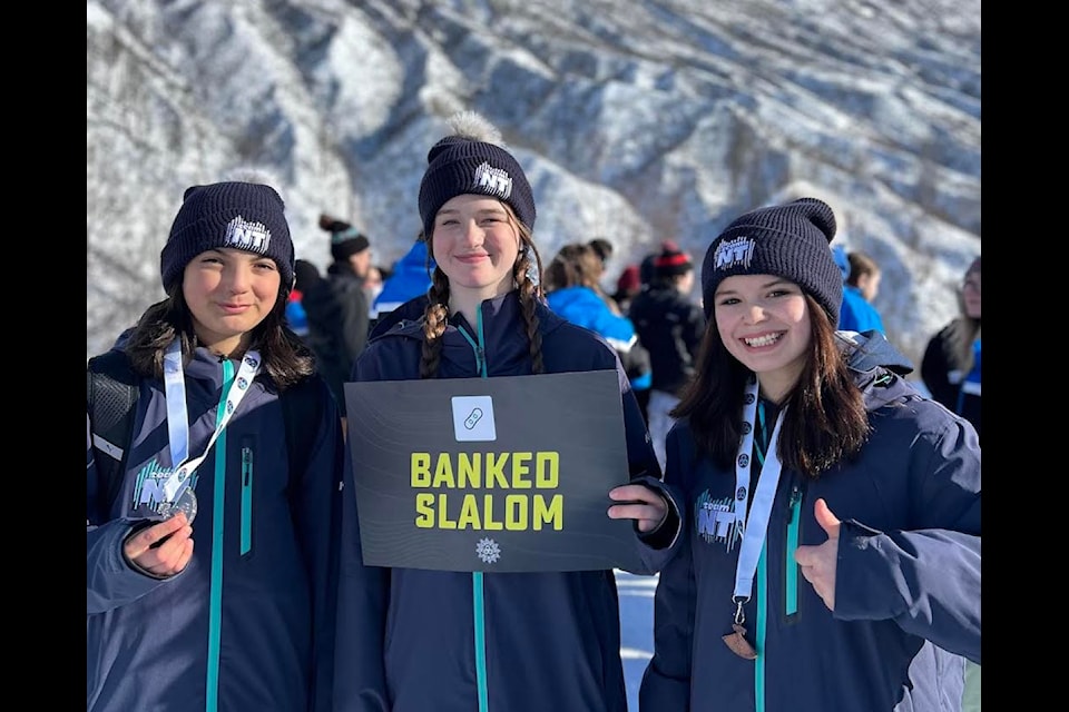 From left, Fort Smith snowboarders Kihew Cabell-White, Kenna McDonald and Storm Cabell-White pose for a photo after the sloped slalom event at the 2024 Arctic Winter Games. Photo courtesy of Allie McDonald