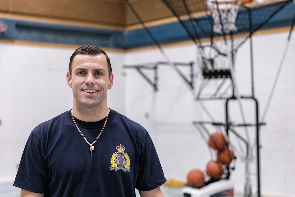 RCMP Cpl. Wesley Neal is using basketball as a way to connect with the community in Whati. Photo courtesy of Thorsten Gohl