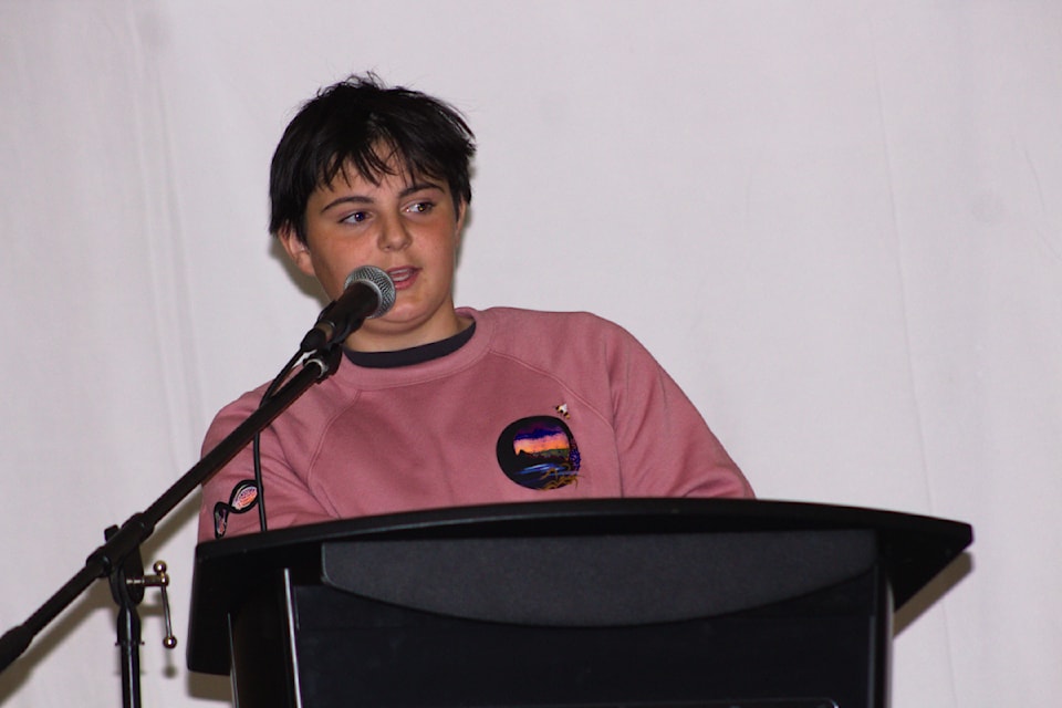 Grade 9/10 Territorial Spelling Bee winner Augustin Lacoursiere-Barthe inquires about the context of his next word.