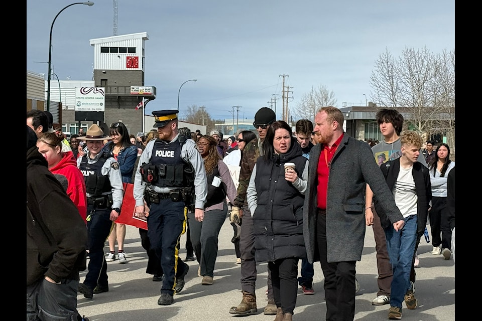 Residents of Hay River march in the name of missing and murdered Indigenous women, girls and two-spirited people on May 5. Nearly 200 people came out to show their respect for those no longer with the community.