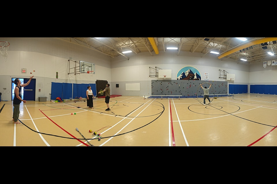 A panorama showing the first circus arts class at Mackenzie Mountain School in Norman Wells held May 24. The free classes are open to anyone interested in learning circus arts and/or acro-yoga. 
Photo courtesy Yvonne Meulenbroek