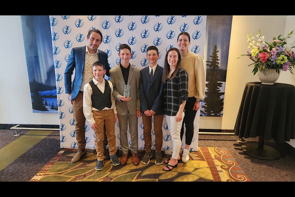 It's a group effort at the Sport North Awards in Yellowknife on Saturday. From left, Brendan Green, Smith Coombs, Kason Coombs, Jaxin Coombs Ashley Coombs and Rosanna Crawford, Green's wife. Photo courtesy of Ashley Coombs