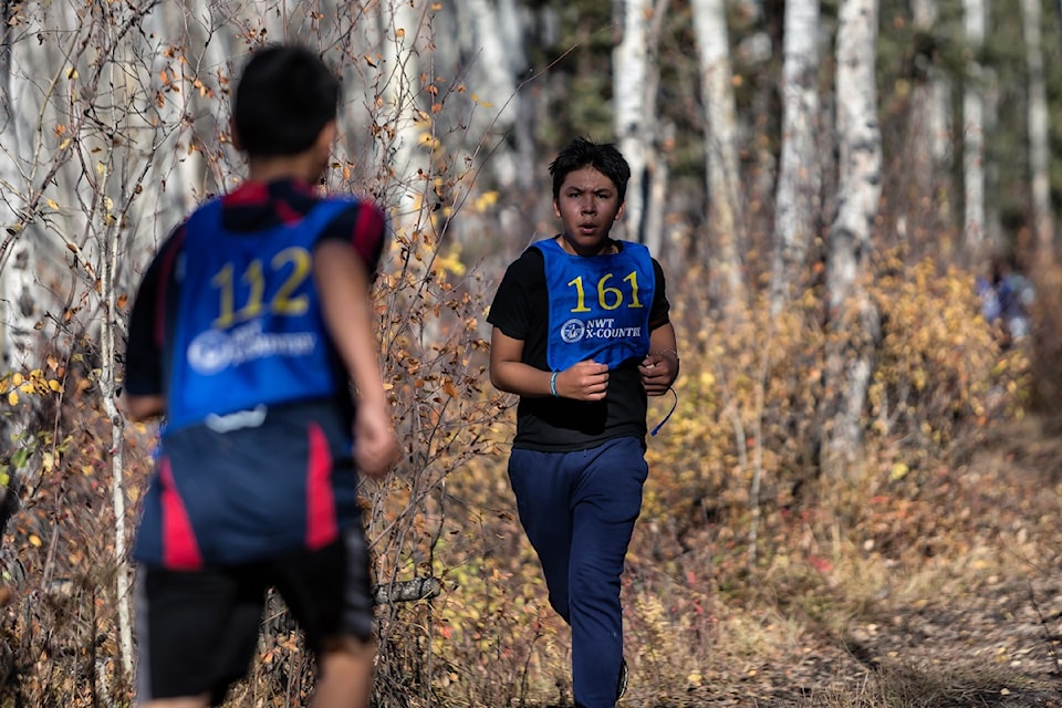 Ethan Mackenzie-Nitsiza of Whati works up a sweat in the U16 boys race.
