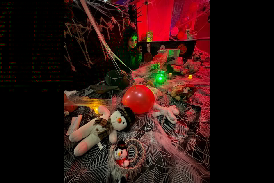Alex MacKenzie shudders with fear wondering if all the stuffies at rest will spring to life in this scary scene. Jill Westerman/NNSL photo