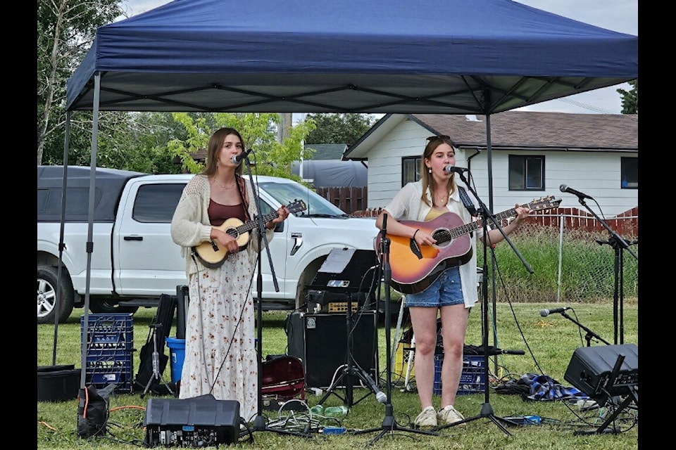 From left, sisters Rochelle and Corinne Smith perform at the 2024 Hay Days Festival in Hay River. This year marked the popular festival's return after a five-year hiatus. Photo courtesy of April Glaicar
