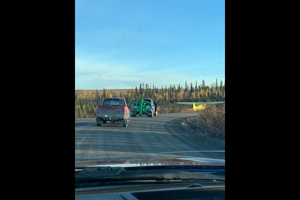 Friends, family and fans of Freddy Carmichael joined forces to close a section the Dempster Highway to both see the plane off and allow it to take flight right off the highway.