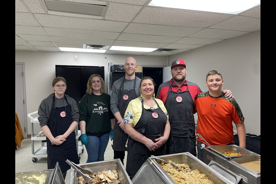 From left, Eva Gordon, Jennifer Butler, Nick Jenne, Delores Kelly, Dwayne Simmons and Chase Simmons were part of the volunteer staff that helped feed people at the Salvation Army on Monday, Oct. 14.