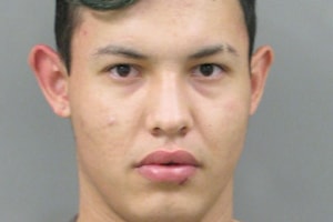 One suspect surrenders, one still at large after Fort Smith home invasion