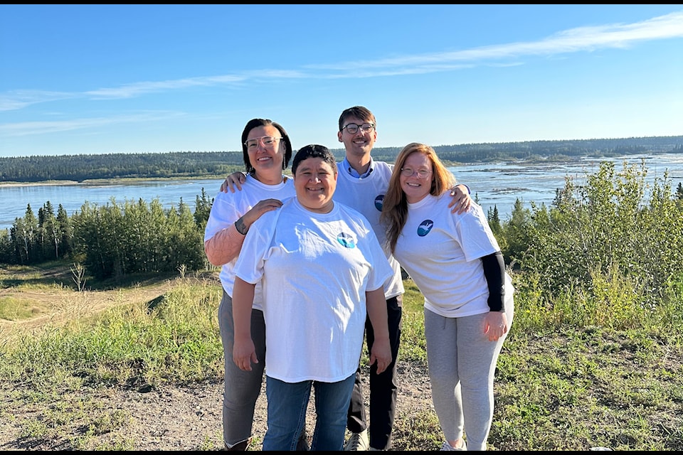 From left, Patricia Heaton, Connie Benwell, Daniel Wiltzen and Emily Prescott were the organizers of the debut Whooping Crane Festival in Fort Smith. The event celebrated the miraculous recovery of the bird, which was once on the verge of extinction. Photo courtesy of Daniel Wiltzen