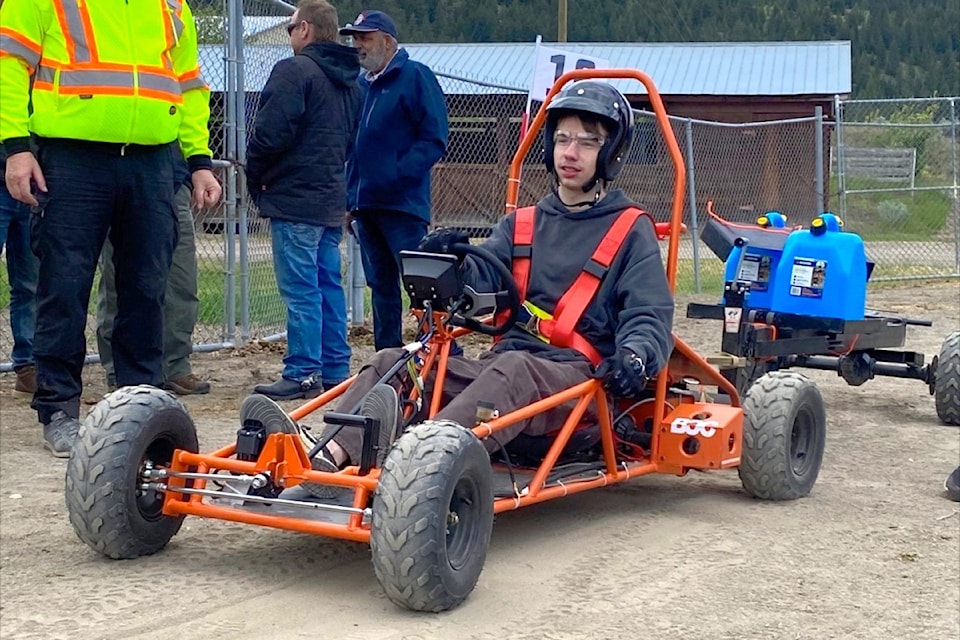 Avery Mackenzie drives Seaquam Car Club's electric go-kart at the inaugural Edison Motors High School EV Challenge in Merritt, B.C. on May 25, 2024. The Seaqum team, made up of Mackenzie, Theo Pitsos and Shaan Rakhr, came in second place overall.