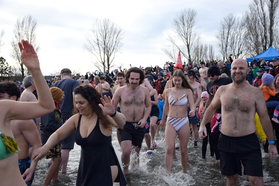 More than 800 brave souls rang in the new year with a plunge into the frigid water of Boundary Bay during the City of Delta's annual Polar Bear Swim, held on Wednesday, Jan. 1, 2025 at Centennial Beach.
