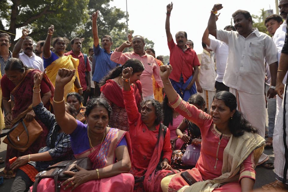 14995414_web1_india-protest-temple