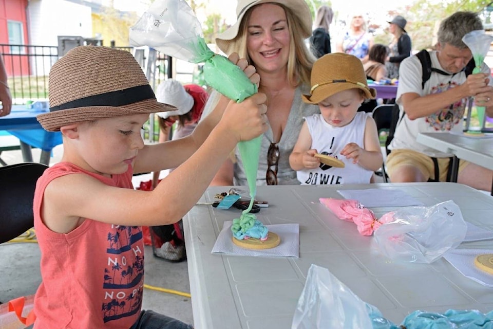 There was lots for attendees to do at the second annual Delta Pride Picnic on Saturday, Aug. 31, including decorating cookies with rainbow icing. (James Smith photo)