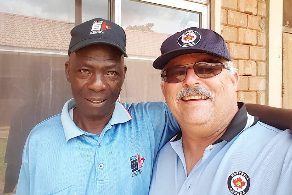 Scott Wheatley snaps a selfie with Peter Anyanzwa in Kamapala after a day of umpire training. Anyanzwa was trained up to the equivalent of a level I umpire, based on the requirements of Softball Canada. (Submitted)