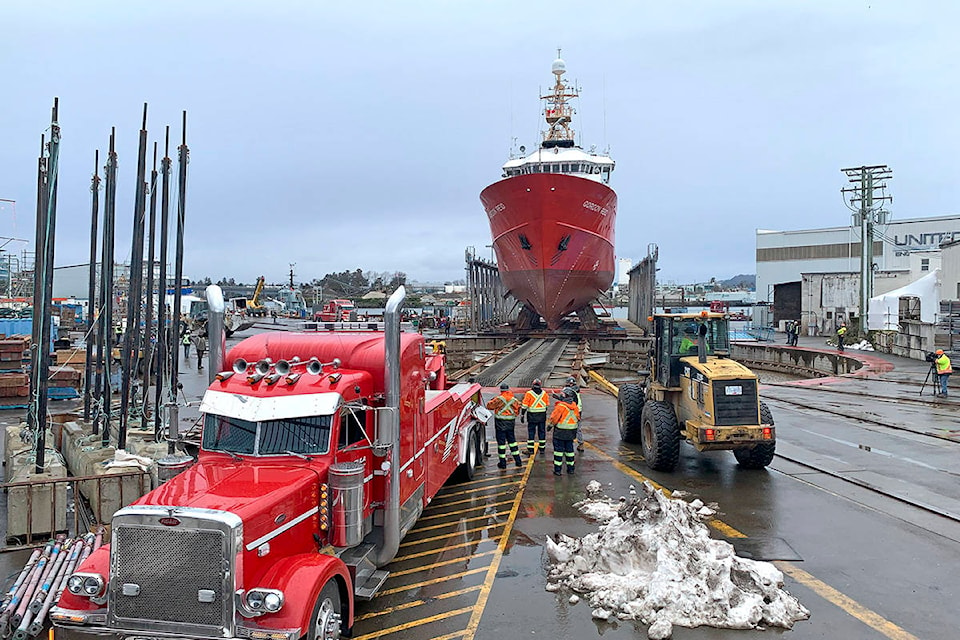An old Highway Thru Hell heavy wrecker tow truck helps to shift an 850-tonne Canadian Coast Guard ship into launching position at the Point Hope Maritime Shipyard Thursday afternoon. (Jane Skrypnek/News Staff)