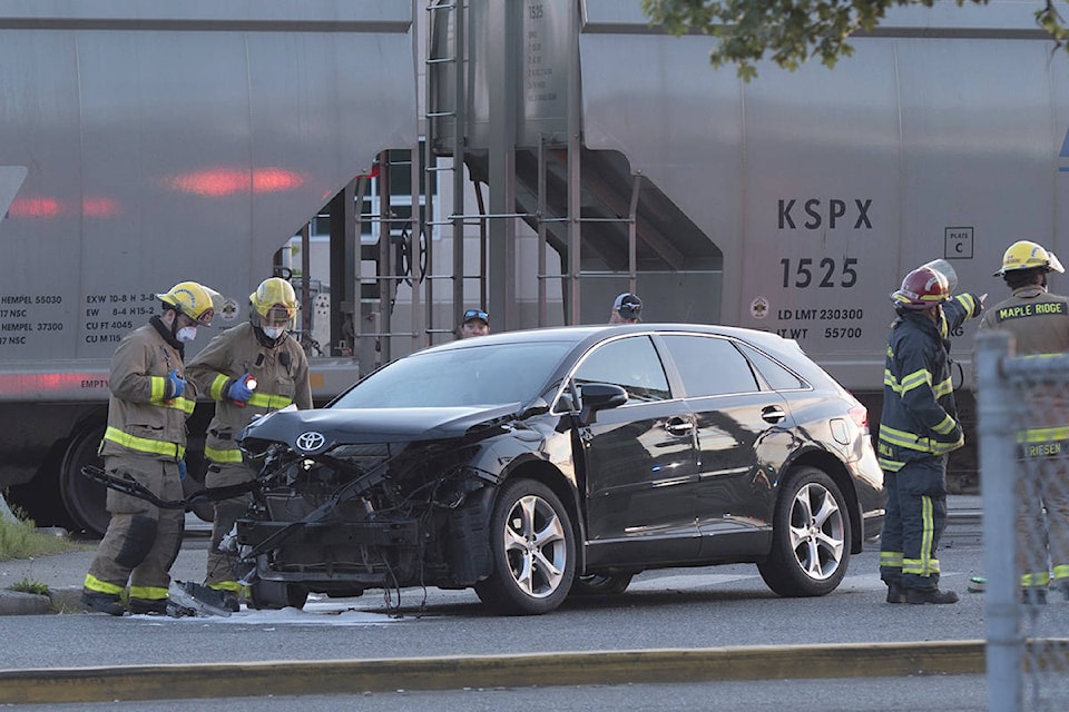 Ridge Meadows RCMP were called to assist Canada Pacific Rail on Wednesday night, May 19, 2021 after a collision between a car and a train. The incident was reported around 8 p.m. near the 203rd Street and Maple Crescent intersection. (Barry Brinkman/Special to The News)