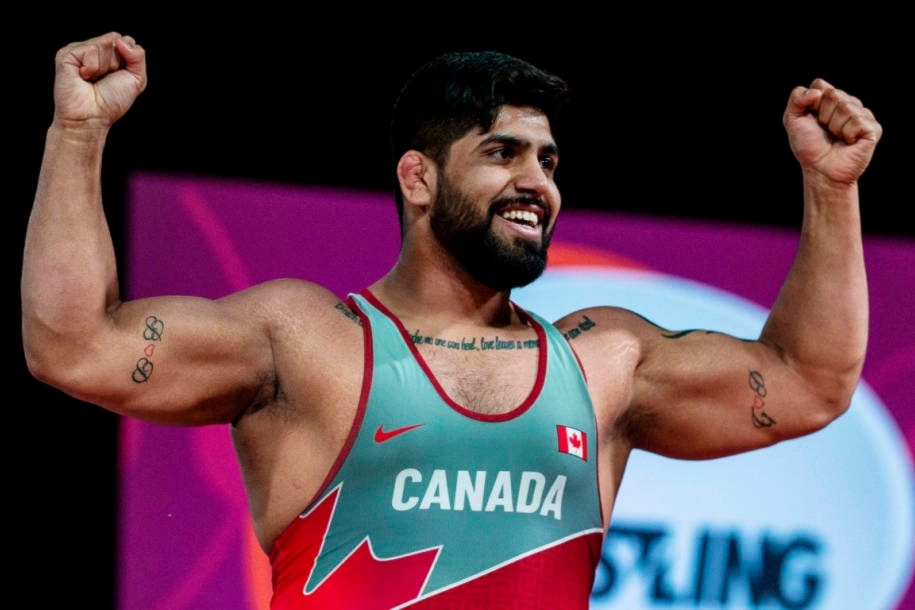 25766503_web1_210715-SUL-SurreyOlympians-dhesi_1