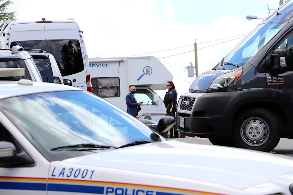 Homicide detectives, alongside RCMP and forensic investigators, were seen gathering evidence from Naomi Onotera’s home on Wednesday, Sept. 15, 2021. The Langley mother was reported missing nearly three weeks ago on Aug. 28, 2021. (Joti Grewal/Langley Advance Times)