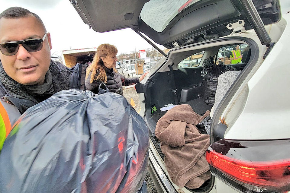 A Langley drive-thru donation drive to help Abbotsford flood victims raised more than $57,000 and filled three five-ton trucks on Saturday, Nov. 20. (Dan Ferguson/Langley Advance Times)