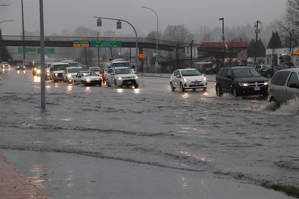 27332536_web1_181211-SNW-M-Surrey-Flood-1