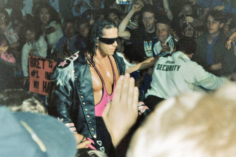 Bret Hart makes his entrance to a WWF ring in Birmingham, England. Photo by Mandy Coombes https://www.flickr.com/people/42014225@N08, licensed under the Creative Commons Attribution-Share Alike 2.0 Generic license.