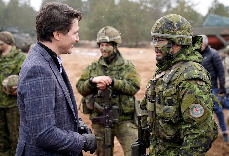 28389938_web1_220308-CPW-Trudeau-NATO-Baltic-LAtvia_1