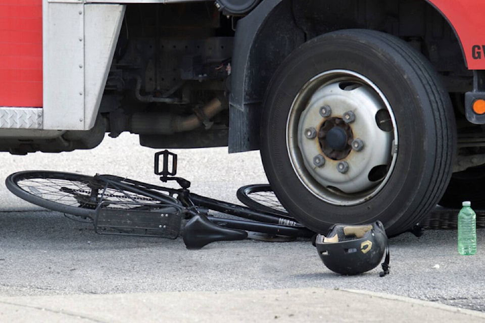 30041284_web1_220818-SUL-Cyclist-truck-crash_1