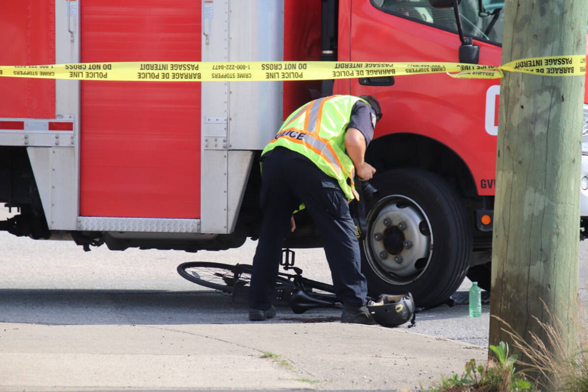 30041284_web1_220818-SUL-Cyclist-truck-crash_3