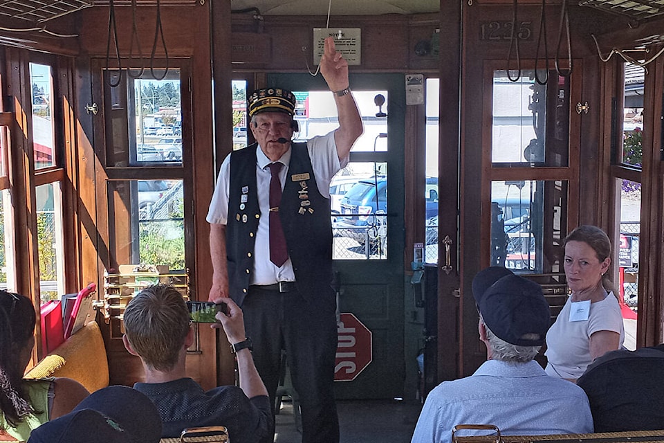 Conductor Don Bruce shares the history of the B.C. Electric Railway with members of the Cloverdale District Chamber of Commerce as they ride the rails Aug. 16. (Photo: Malin Jordan)