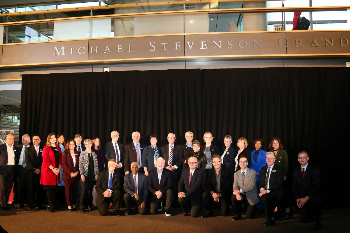 The group who attended the SFU Surrey unveiling of the Michael Stevenson plaque in the grand hall at SFU Surrey in Surrey on Thursday, Nov. 17, 2022. (Photo: Anna Burns)