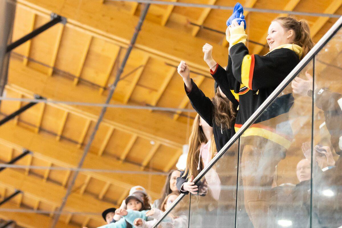 A fan catching a t-shirt after a goal during the Fire & Ice charity game at WickFest at North Surrey Sport and Ice Complex in Surrey on Saturday, Feb. 4, 2023. (Photo: Anna Burns)