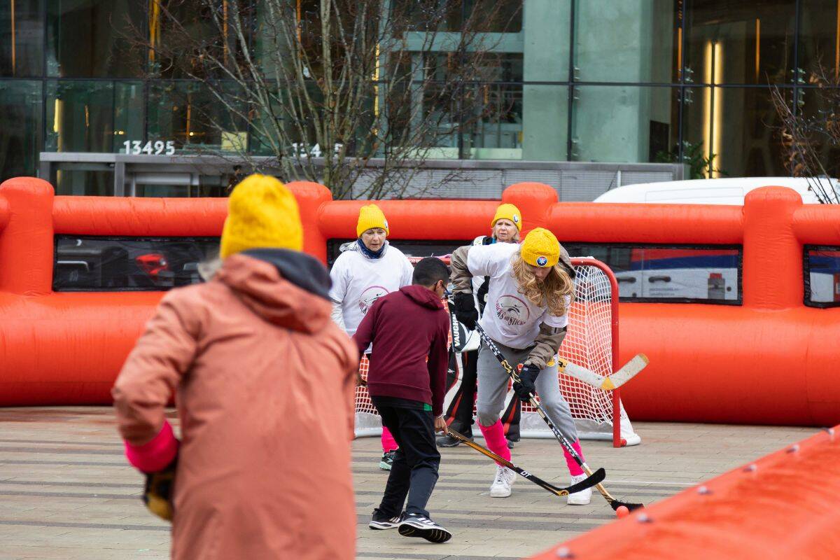 A Toque Tuesday road hockey game at Civic Plaza in Surrey on Tuesday, Feb. 7, 2023. (Photo: Anna Burns)