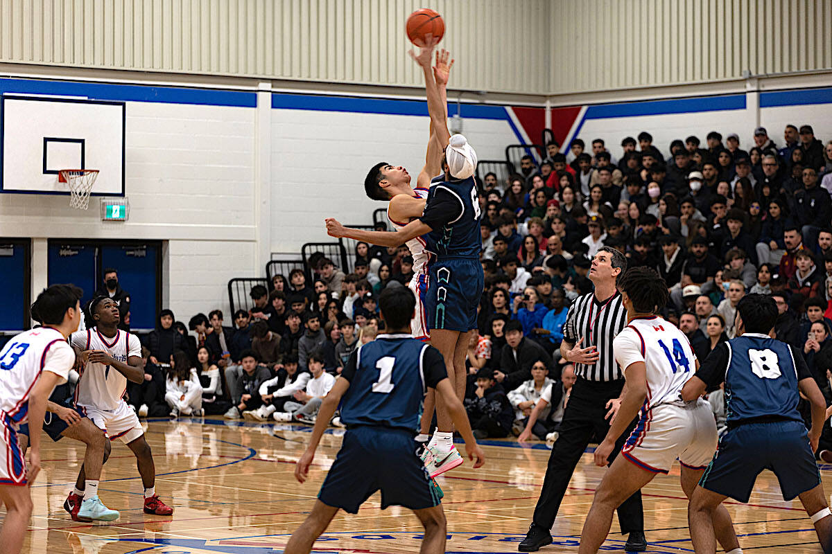 Fleetwood Park Dragons (in blue) and Semiahmoo Thunderbirds in action at Semis gym during the final of the South Fraser AAAA boys basketball championship Friday, March 3, 2023. Semiahmoo won 82-56 to earn the regions top seed heading into the B.C. provincial tournament starting Wednesday, March 8. (Photo: Jason Sveinson)