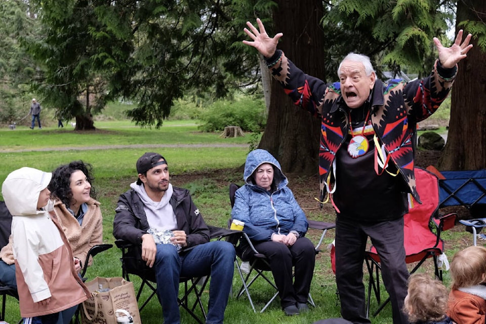 Chief Phil Lane Jr. tells stories of Dakota culture during an Earth Day event April 22, 2023 at Kwomais Point Park. The gathering was hosted by the White Rock and South Surrey Jewish Community Centre and included a guided tour of petroglyphs along Crescent Beach. Full story and more photos can be found on page A11. (Geoff Yue photo)