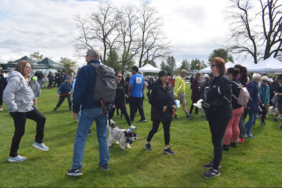 Participants warm up before the 20th annual Hike for Hospice Sunday (May 7) at Blackie Spit Park in Crescent Beach. Proceeds raised benefit the Peace Arch Hospice Society. (Tricia Weel photo)