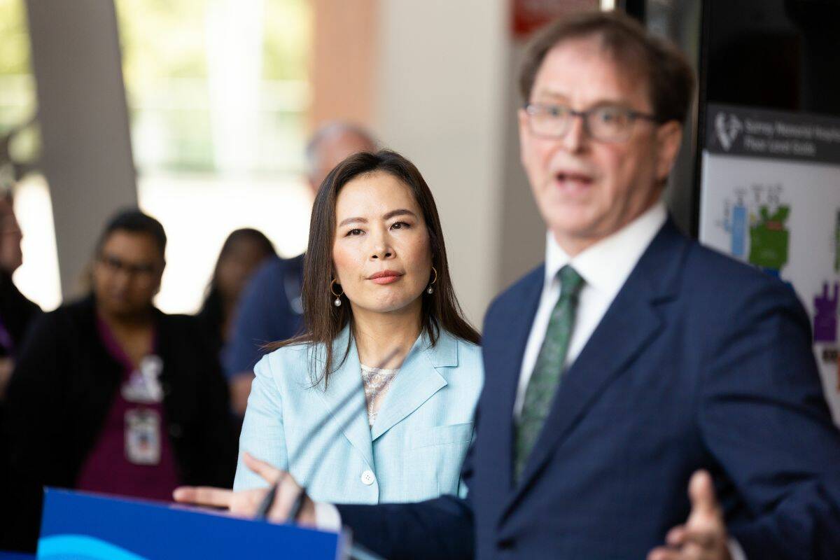 B.Cs Health Minister Adrian Dix, right, and Fraser Health CEO Dr. Victoria Lee at a health care announcement at Surrey Memorial Hospital in Surrey on Wednesday, June 7. (Photo: Anna Burns)
