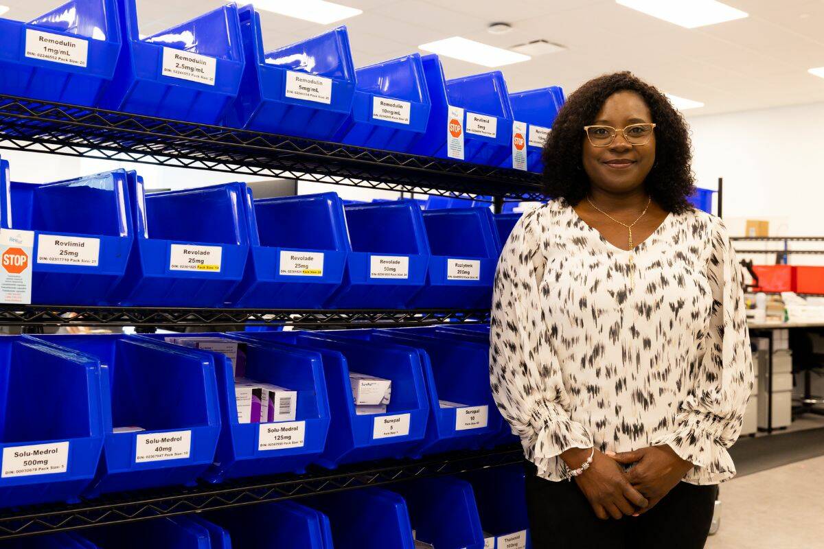 Uchenwa Genus, vice president of specialty pharmacy for McKesson Canada, poses for a photo in Surreys specialty pharmacy on June 9, 2023. (Photo: Anna Burns)