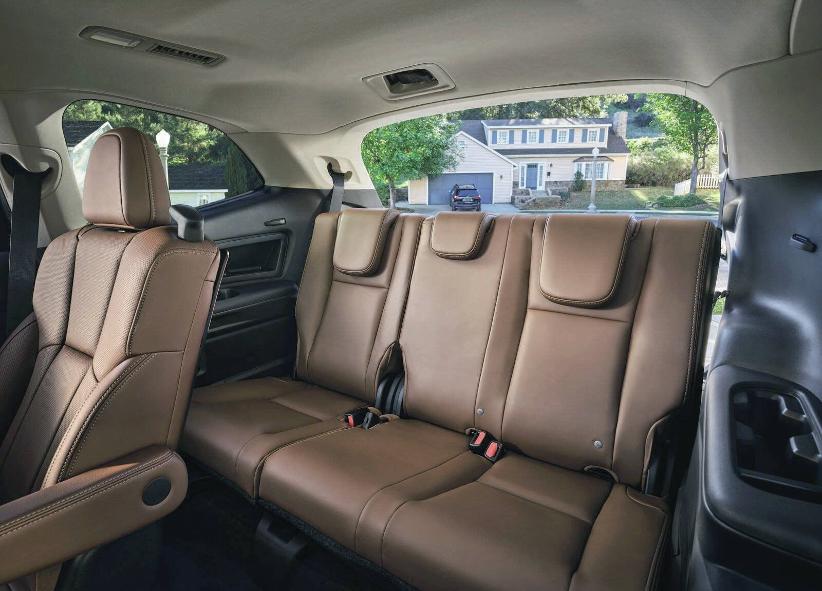 Although the rear seat of the Ascent can hold three passengers, its still a tight squeeze. Access to the rear row is a breeze, though. PHOTO: SUBARU