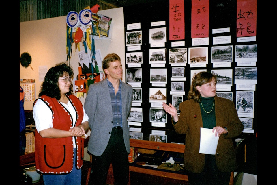 Louise Avery speaks to a packed house for the opening of the multicultural exhibition, “It’s A Small World,” in 1997.
