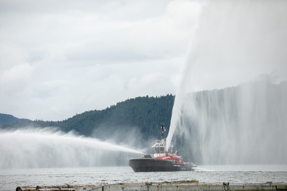 The HaiSea Wamis, a fully electric tugboat to serve LNG Canada operations, demonstrates its firefighting capacity upon its arrival in Kitimat. 