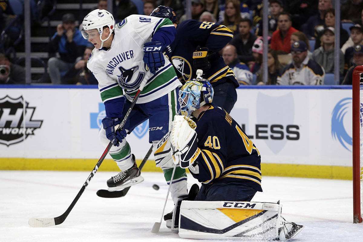 14348912_web1_181110-IFD-Canucks-Sabres3