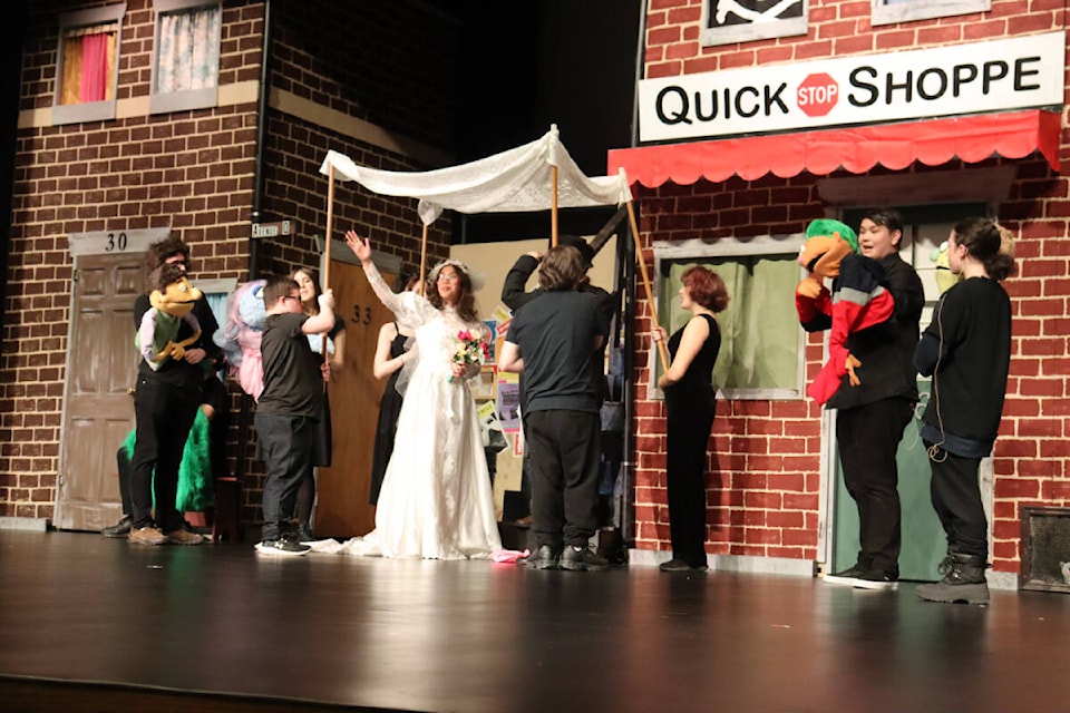 Students perform the wedding scene during the MEMSS stage production of Avenue Q Jan. 28. (Hunter Wild).