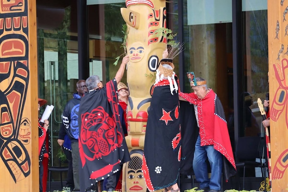 Haisla elders unveil and bless the totem pole outside the new Haisla Health Centre in Kitamaat Village last fall. (Misty Johnsen/Northern Sentinel)