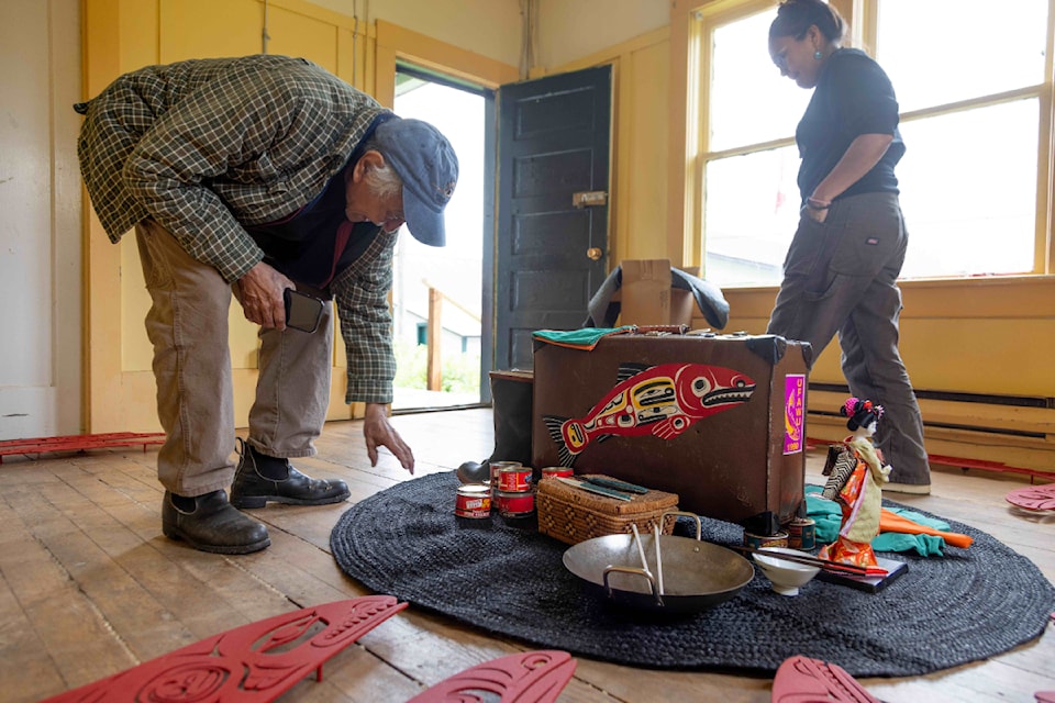Dempsey Bob works on installing one of the installation pieces for his SALMON: Cannery Days exhibit at the North Pacific Cannery in Port Edward. The exhibit is on from Aug. 9 to Sept. 30.