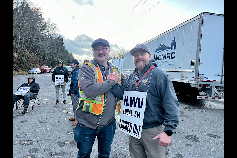 Keith Cociani (left) president of the ILWU Local 505 joins Nathan Lavallee, third vice president of Local 514 on the picket line in Prince Rupert Nov. 4.