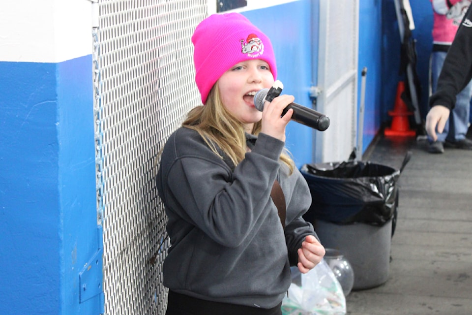 Emmie Knowlan, 11, sings the national anthem at the Rampage's season-ender at the Jim Ciccone Civic Centre Feb. 1.