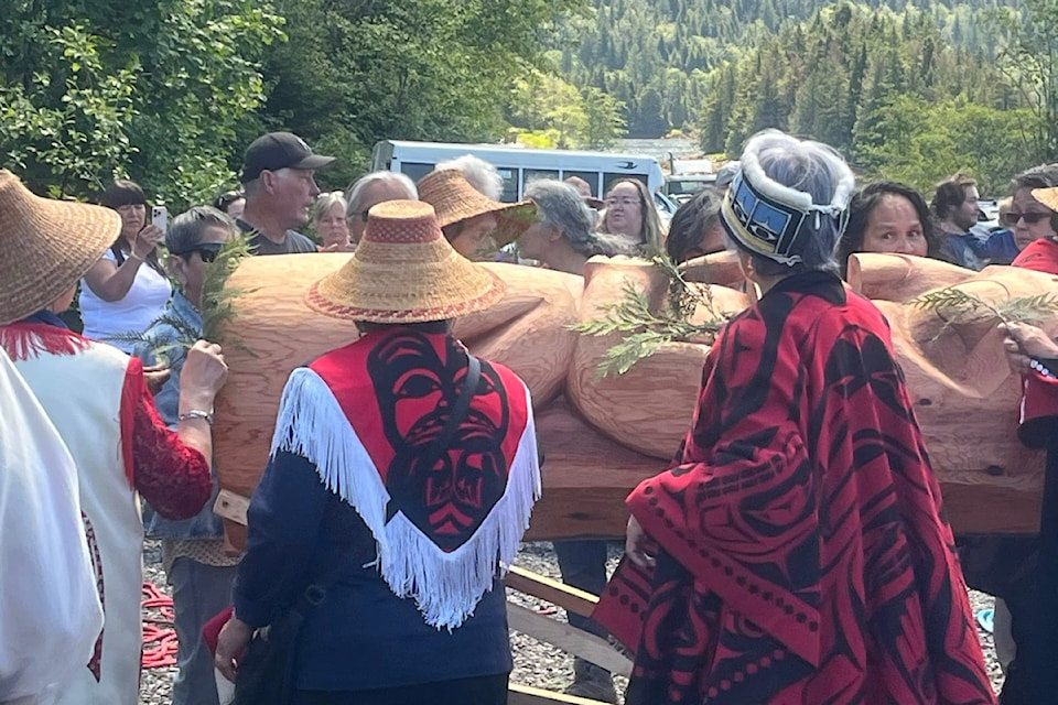 The Miller Bay TB Hospital monument is blessed before being raised at the entrance to the former hospital site on Hwy 16 near the turnoff to Port Edward.