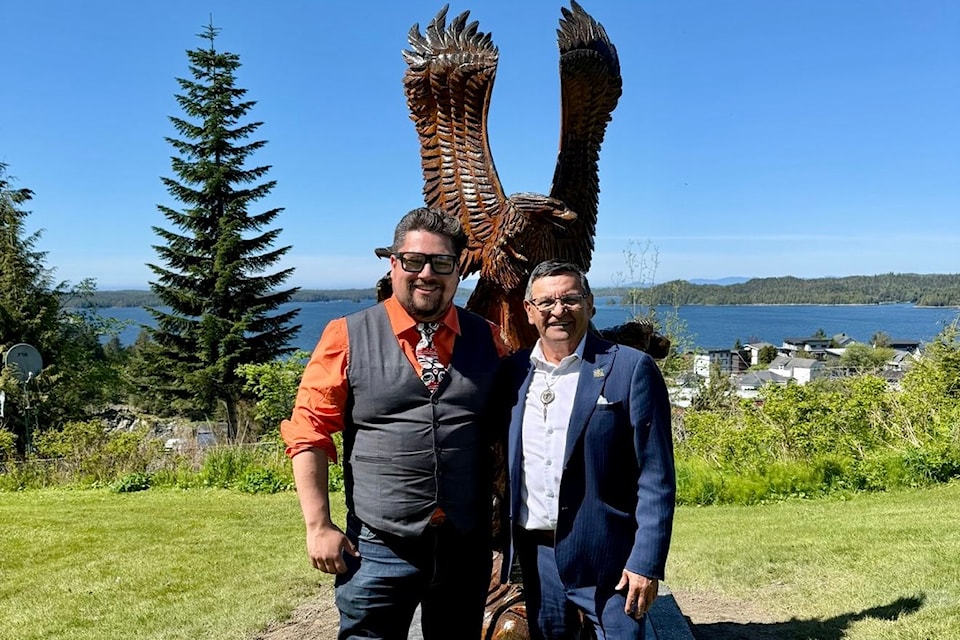 Prince Rupert Councillor Reid Skelton-Morven (left) and Chetwynd's Mayor Allen Courtoreille (right) at the unveiling of the "Survival of the Fittest," art piece at the Totem Park in Prince Rupert on May 12, 2025.